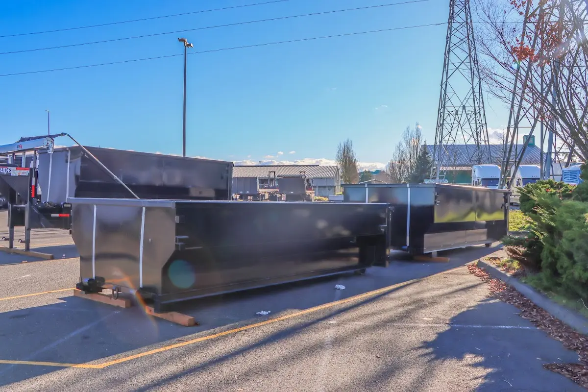 Roll-off dumpster ready for waste disposal at job site for Yard Waste Dumpster Rental in Sunrise